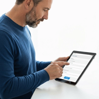 User submitting online form on tablet