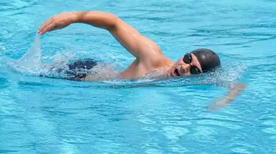 User swimming for exercise